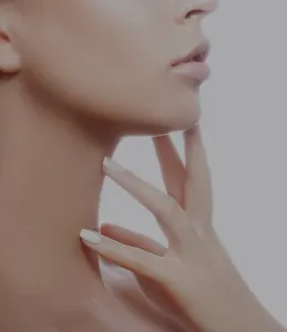 close up of a woman's chin and neck